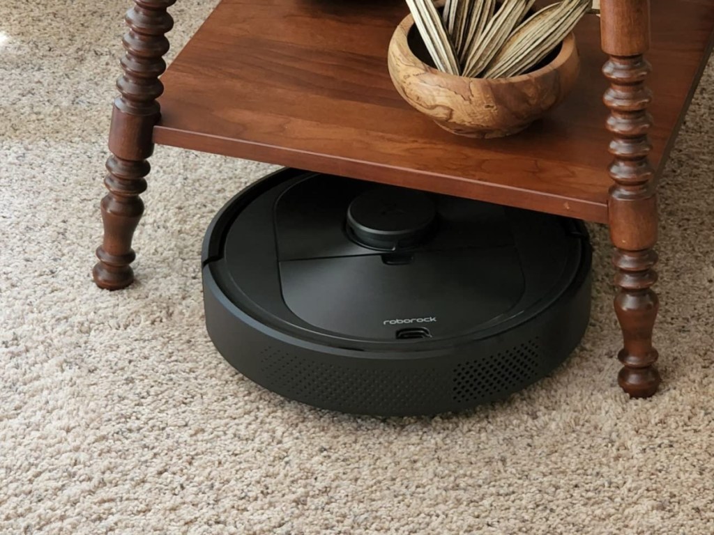 robot vacuum under end table