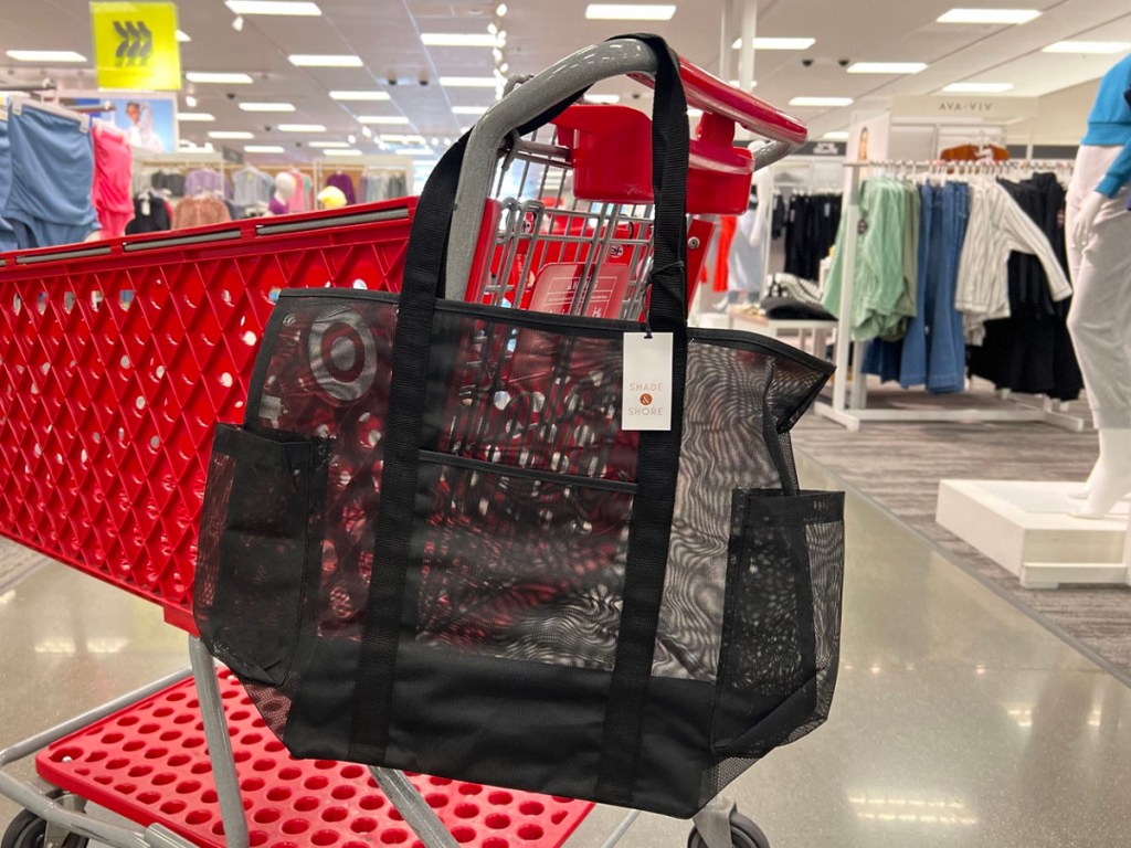 black mesh tote hanging on target shopping cart