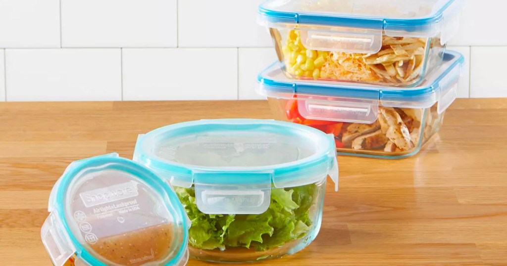 4 snapware containers with food inside on table