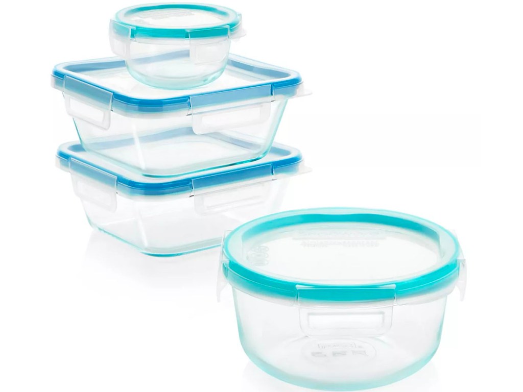 four empty glass snapware food storage containers
