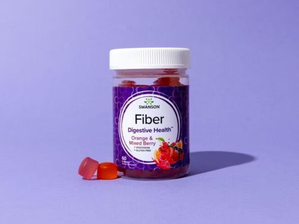 Swanson Fiber gummies bottle with purple background