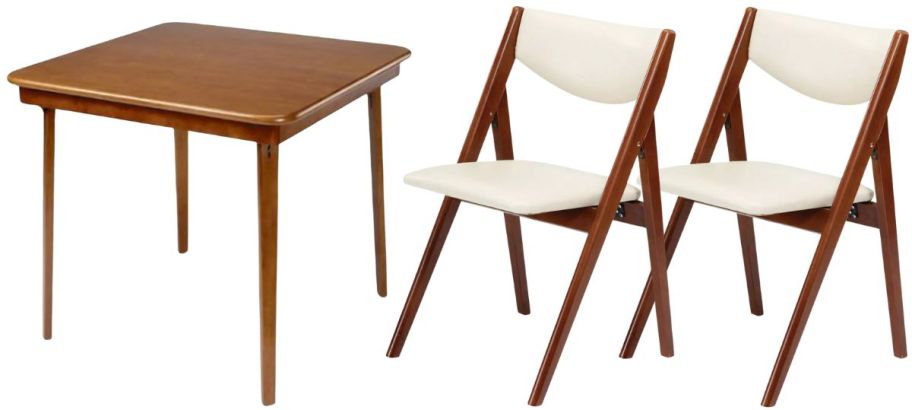 a wooden folding card table and two cushioned wooden folding chairs