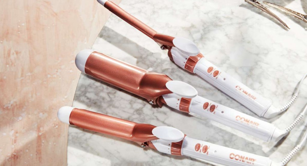 three Conair Double Ceramic Curling Irons displayed