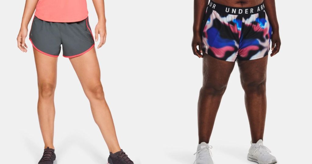 woman wearing gray and pink under armour shorts and woman wearing tie dye under armour shorts