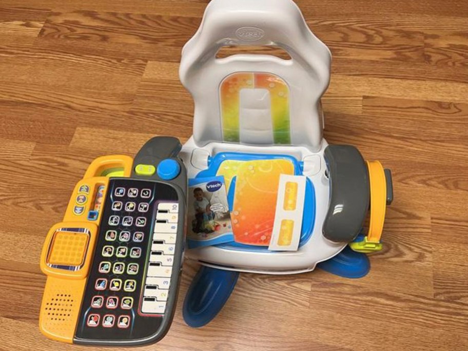 vtech gaming chair toy sitting on hardwood floor