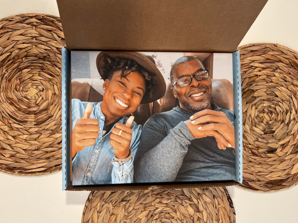 canvas of daughter and father inside box