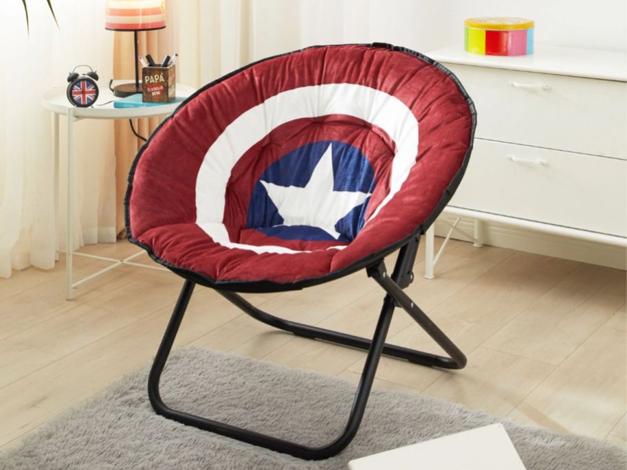 oversized saucer chair with the Captain America sword in a bedroom