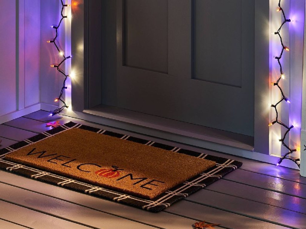 welcome doormat displayed in front of door