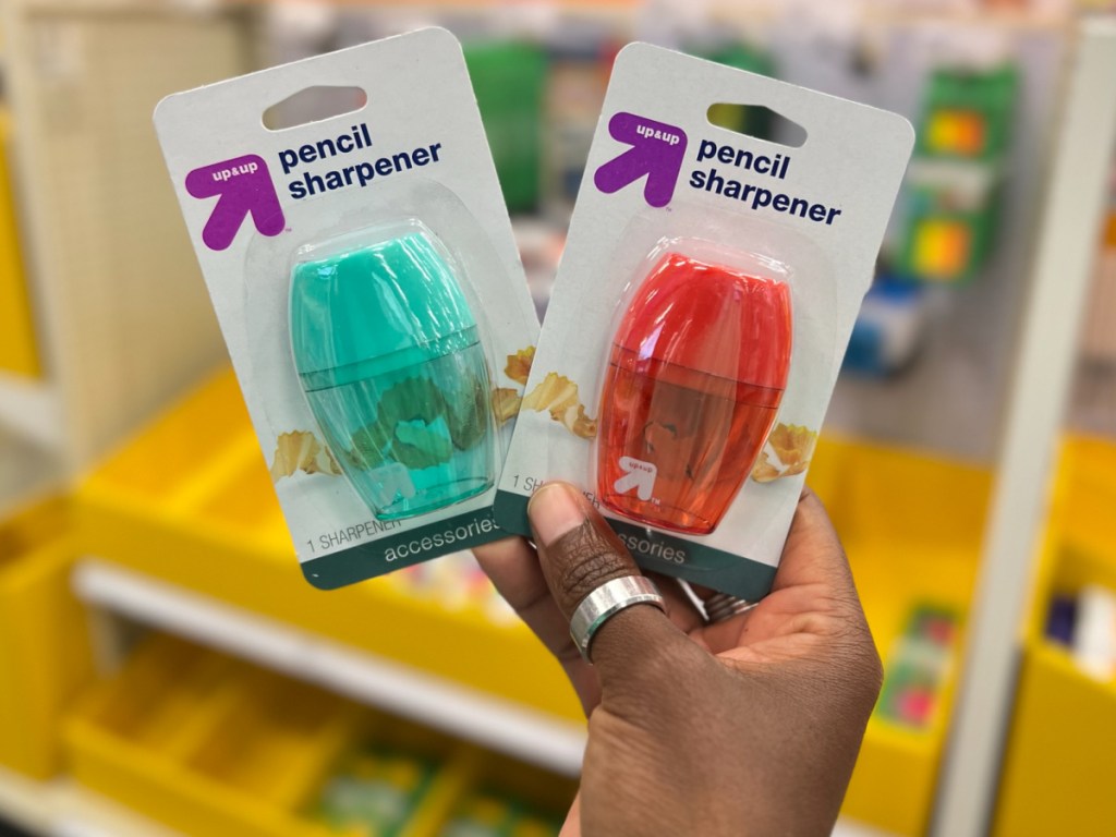 woman holding two Up & Up Pencil Sharpener
