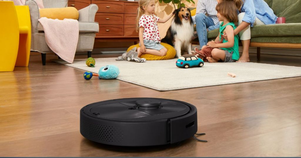 Roborock Q5 Robot Vacuum with 2700Pa Power Suction shown with family in the background