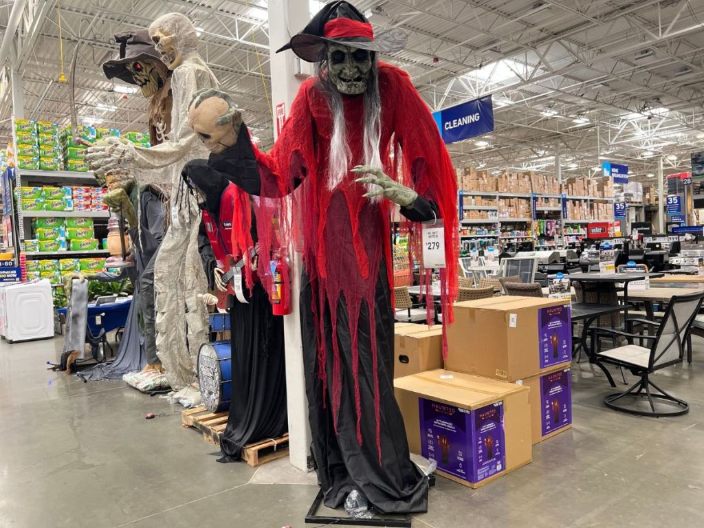Haunted Living 8-ft Lighted Animatronic Witch with Skulls at Lowe's