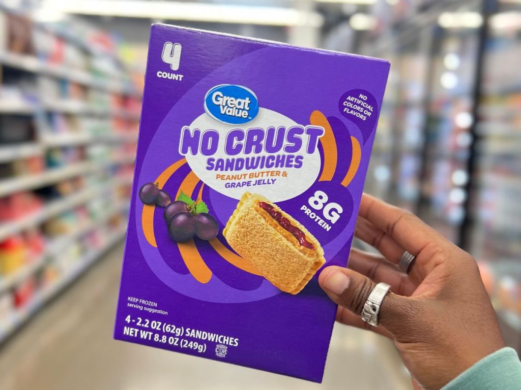 Great Value No Crust Peanut Butter & Grape Jelly Sandwiches box woman's hand at Walmart