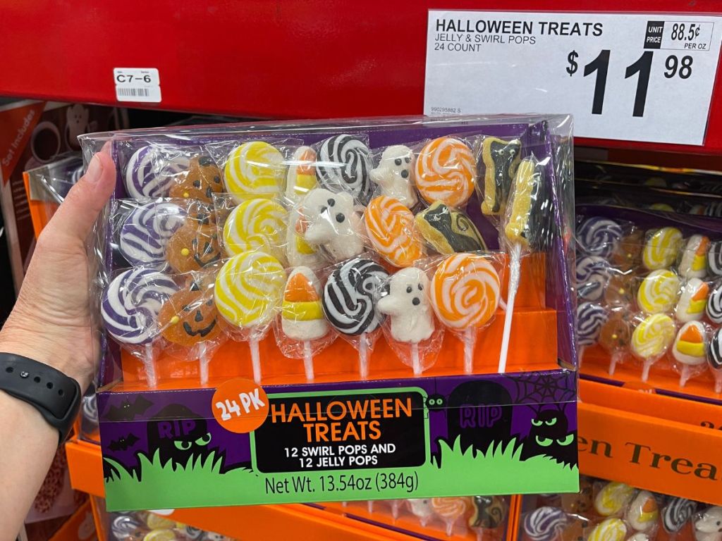 Halloween Treats Swirl Pops & Jelly Pops 24 Count in woman's hand at Sam's Club