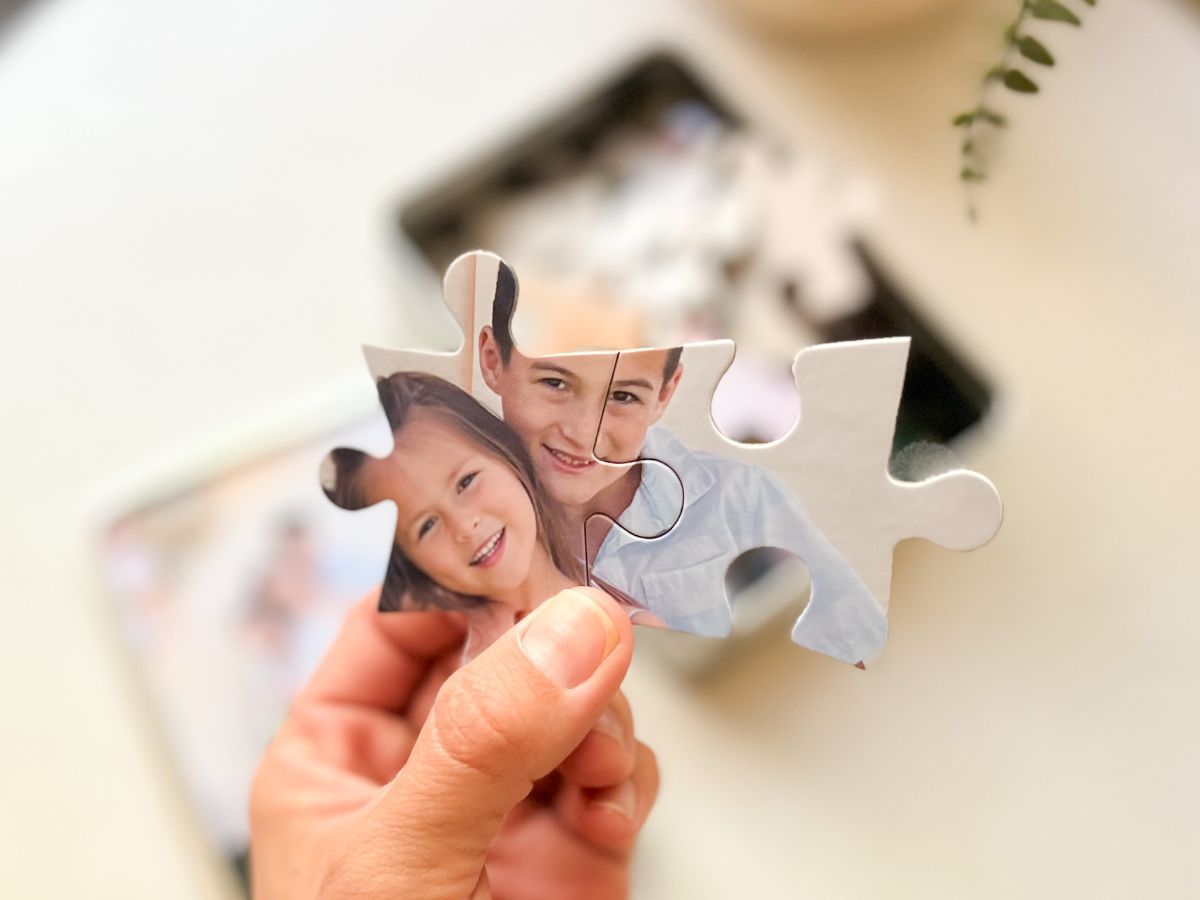 Walgreens Photo Puzzle pieces shown in a woman's hand