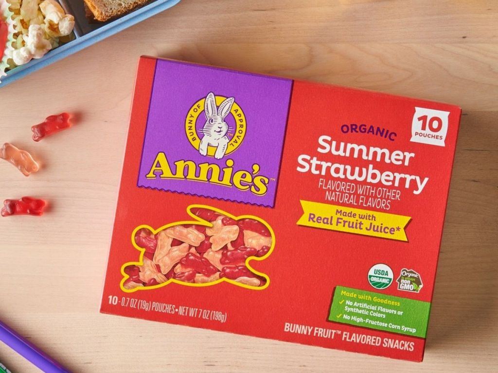 annie's summer strawberry fruit snacks on counter next to lunchbox