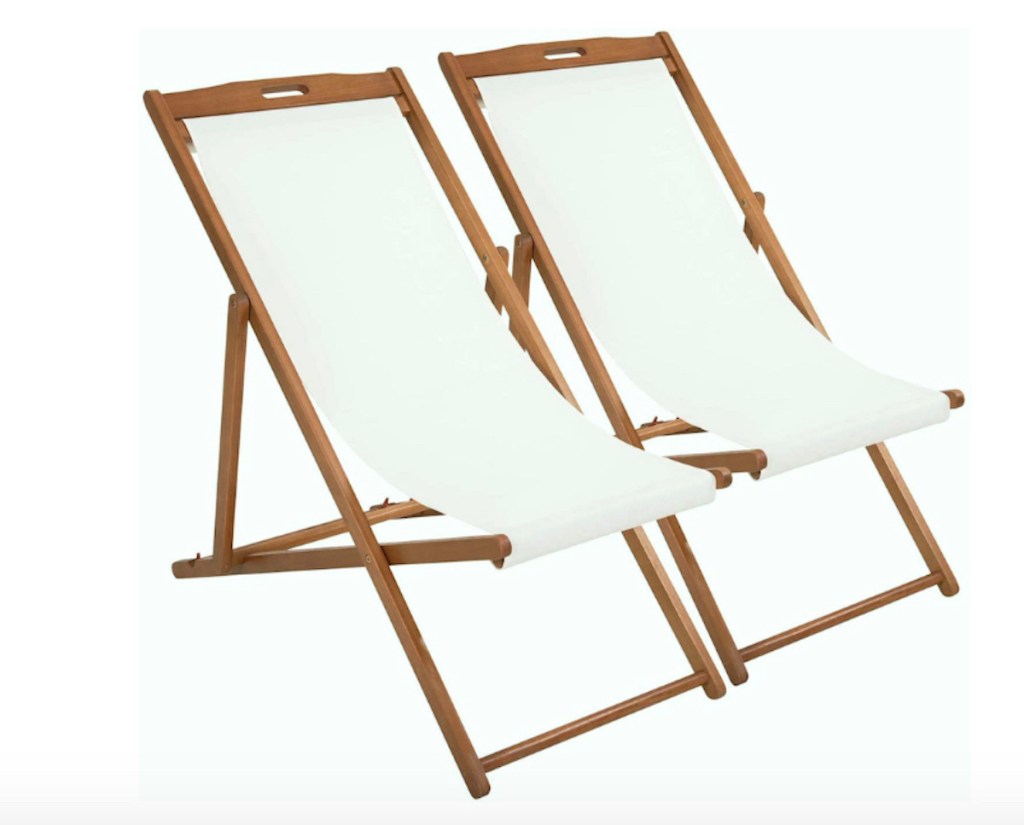 stock photos of two wood and white sling beach chairs on white background