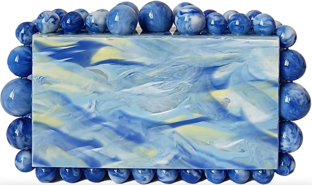 blue marble purse stock photo