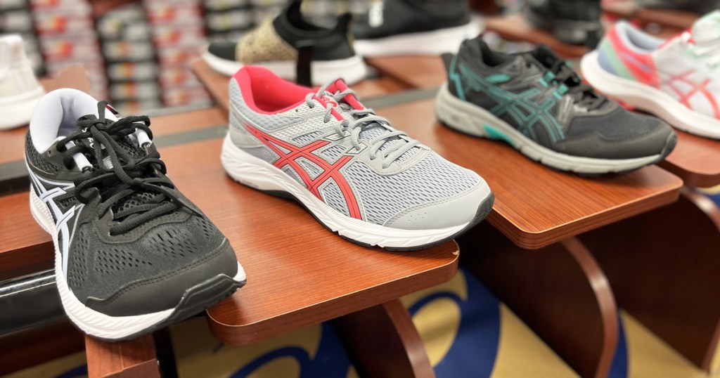 asics running shoes on display in store