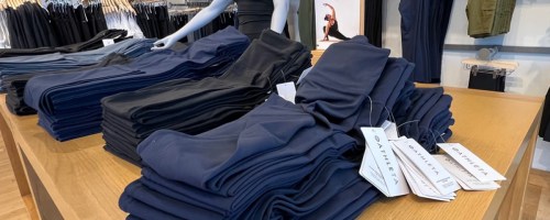 display table of leggings in store