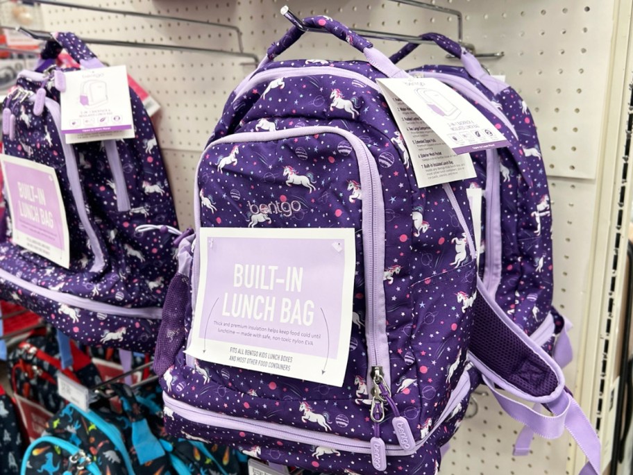 Purple backpack with unicorn print