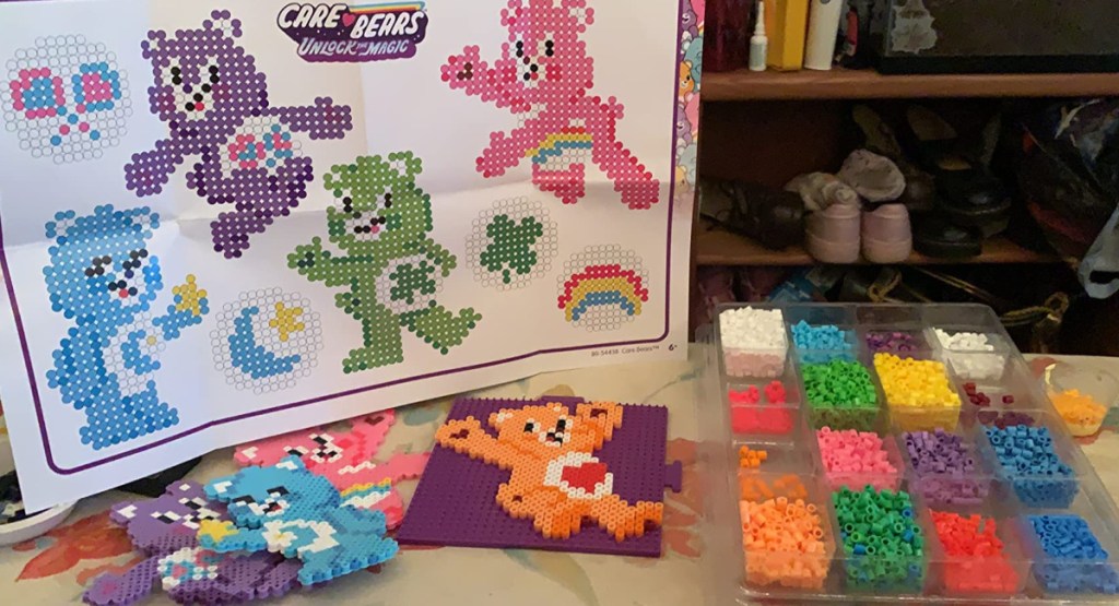 Care Bears bead kit displayed on table with the designs showcased