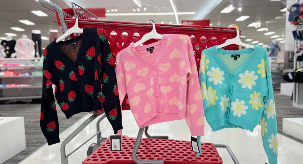 Colorful kids Cardigans displayed on Target cart