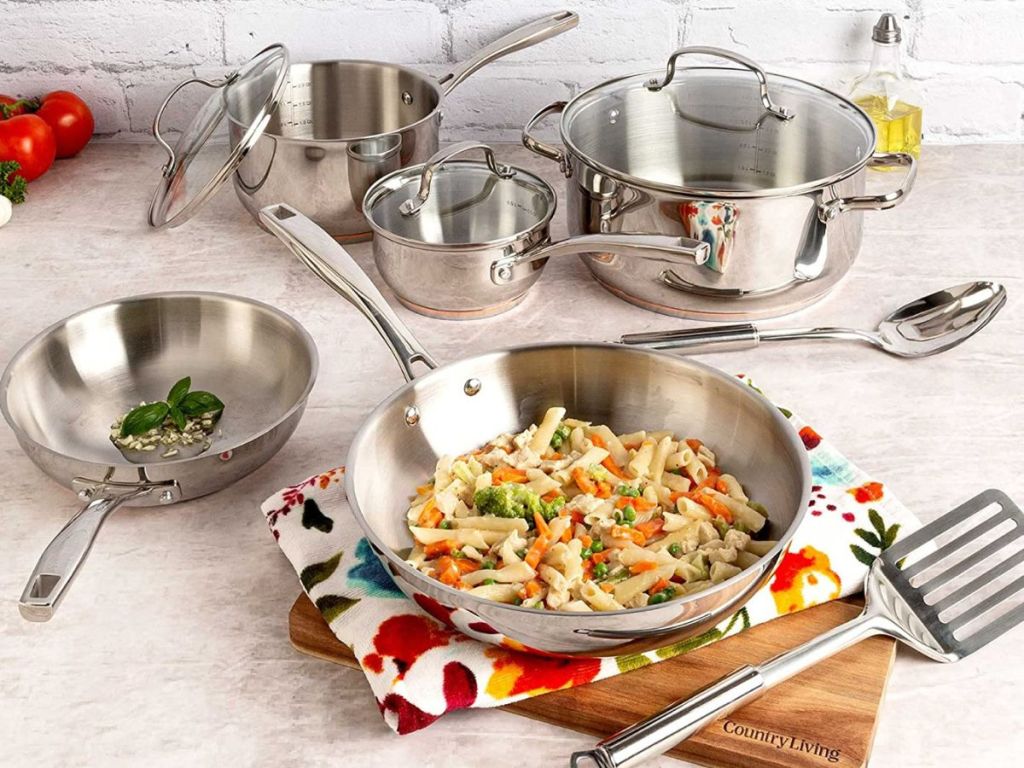 Country Living Stainless Steel Cookware on a counter with a pan filled with pasta