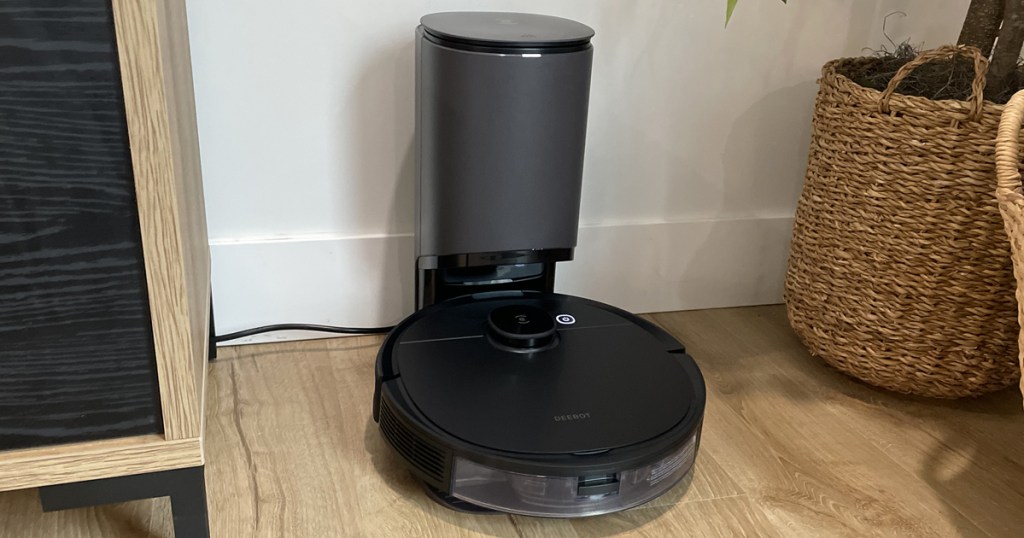 black robot vacuum on it's self-empty base