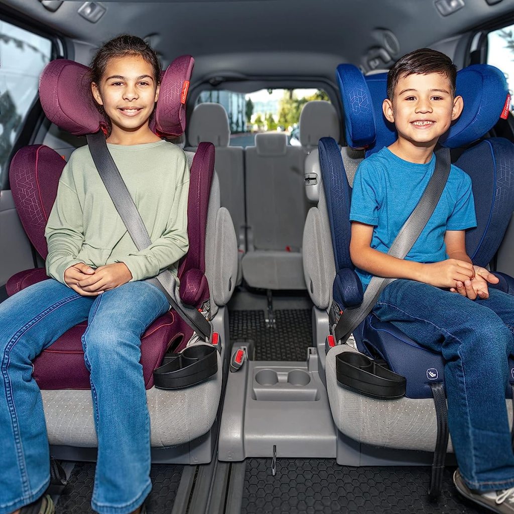 Two kids sitting in Diono booster seats in a car