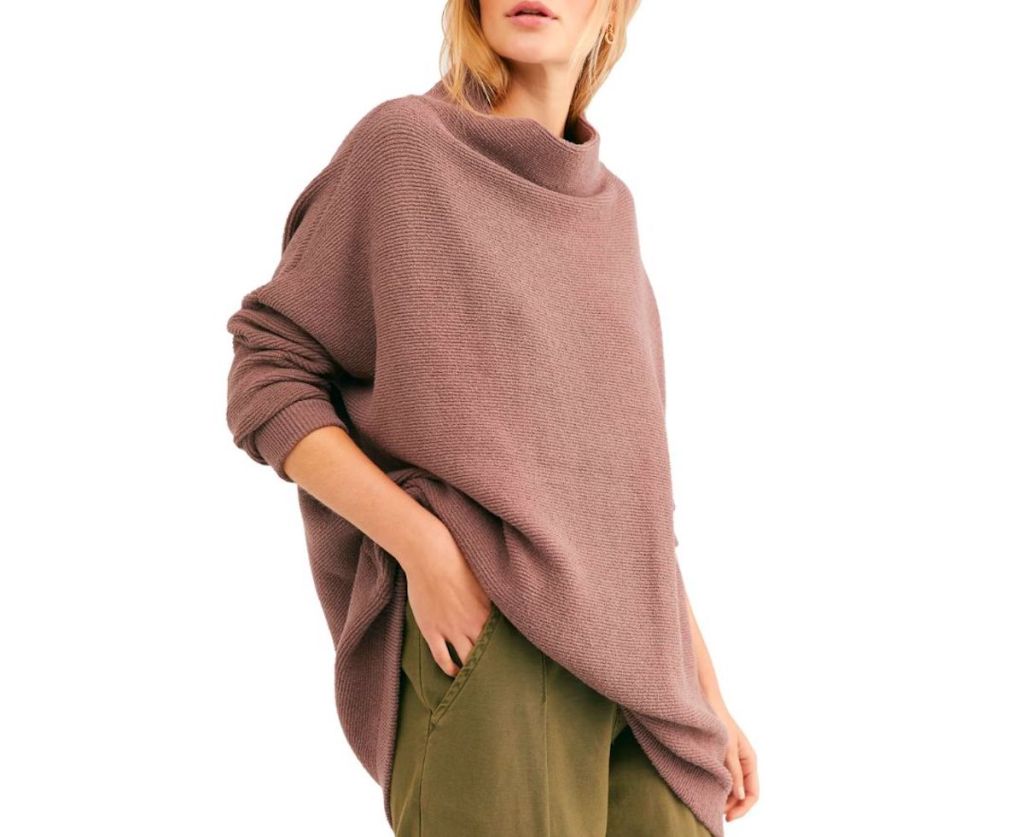 stock photo of woman wearing slouchy ribbed tunic sweater