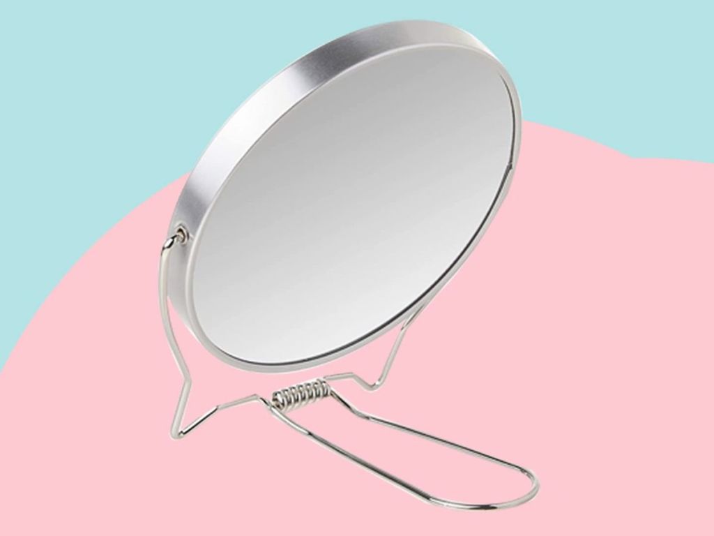 Makeup mirror with a stand