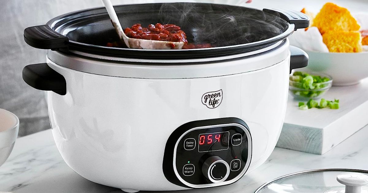 GreenLife Cook Duo a ladle dipping out red beans from a Ceramic Nonstick Programmable 6 Quart Slow Cooker in White 