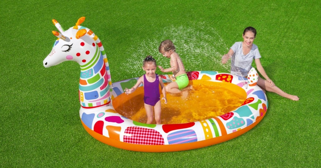 kids playing in H2OGO! Groovy Giraffe Inflatable Play Pool w/ Sprayer