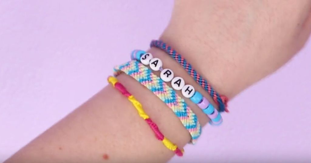 bracelets on a little girls arm from the Just My Style 2-in-1 Plastic Jewelry & Bracelet Making Set