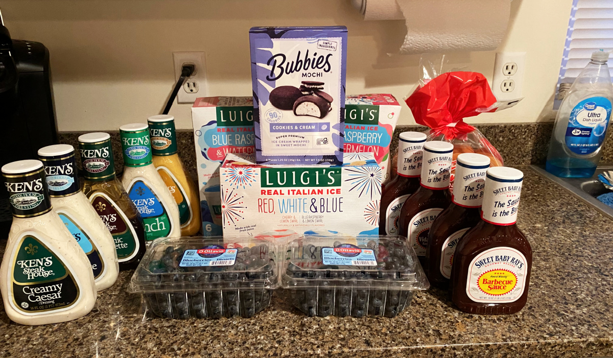 Groceries on a kitchen counter bought with cash back apps by one Happy Friday reader