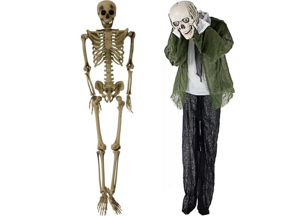 Haunted Hill Farm 60 Skeleton Hanging Decoration and Haunted Hill Farm 5-ft Pre-Lit Animatronic Zombie stock images