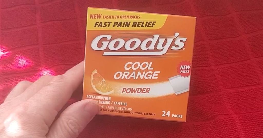 Goody's Extra Strength Headache Powder, Cool Orange Flavor Dissolve Packs, 24 Individual Packets box shown with man's hand