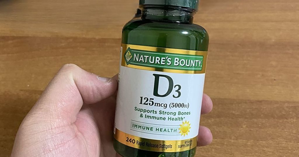 Nature's Bounty Vitamin D3 Bottle in person's hand