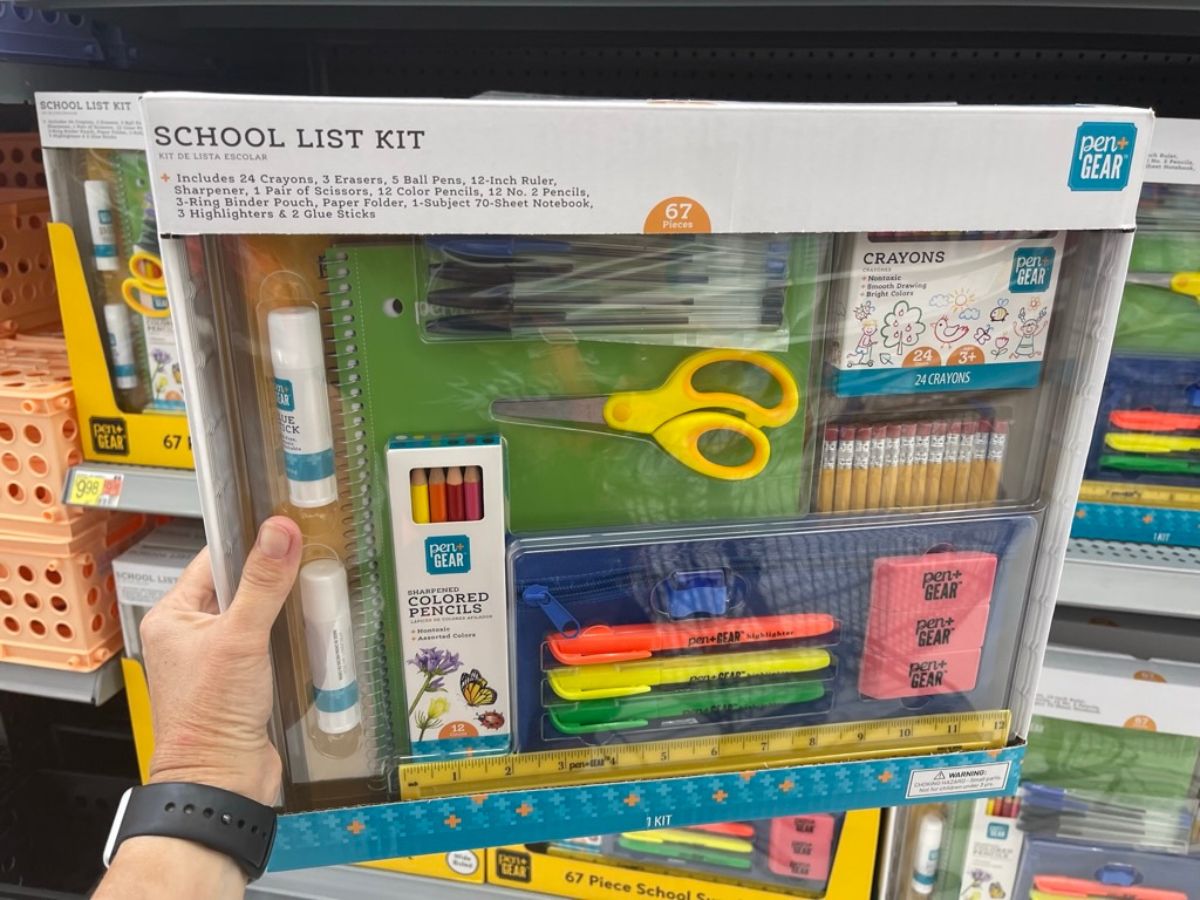 Pen + Gear School List Kit with school supplies in woman's hand at Walmart