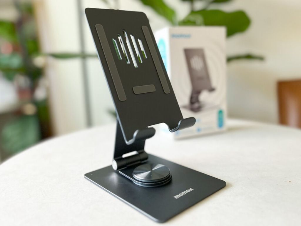 MOMAX 360 Rotating iPad Stand shown on table with box behind it
