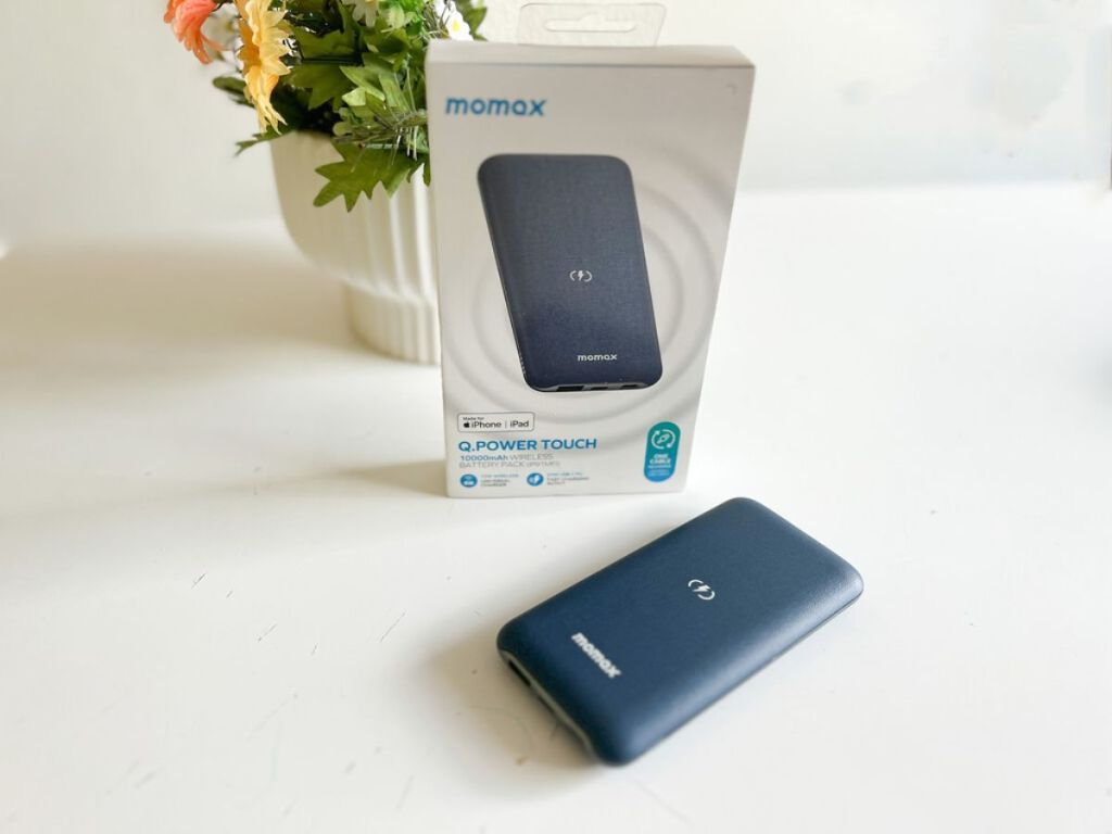 Momax Portable Charger Power Bank shown with box and charger on counter