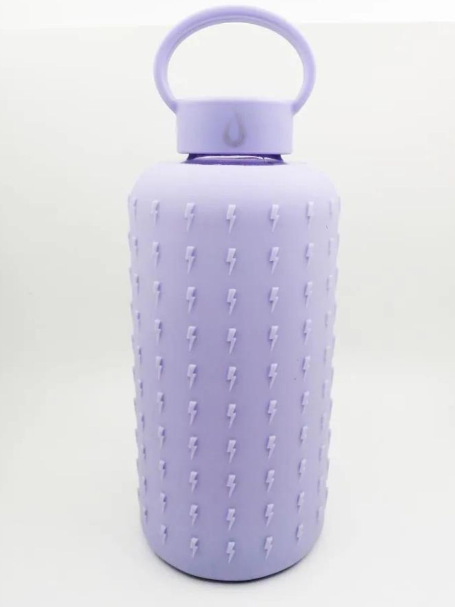 A purple water bottle with raised lightning bolts 