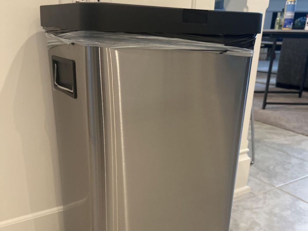 stainless steel garbage can in kitchen