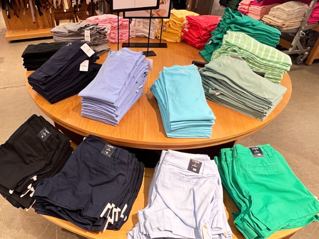 display table of women's tank tops and shorts