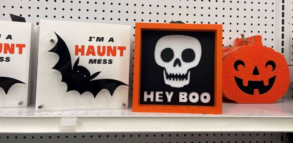 Joann Halloween Signs on a shelf