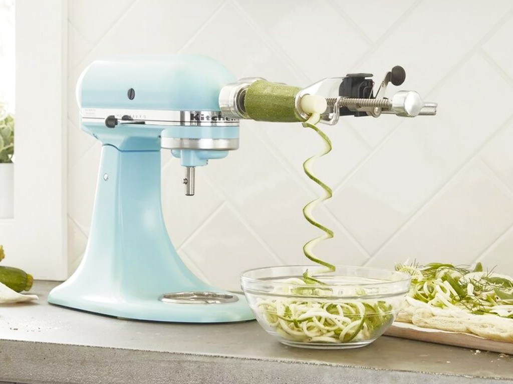 light blue kitchenaid mixer with vegetable spiralizer attachment