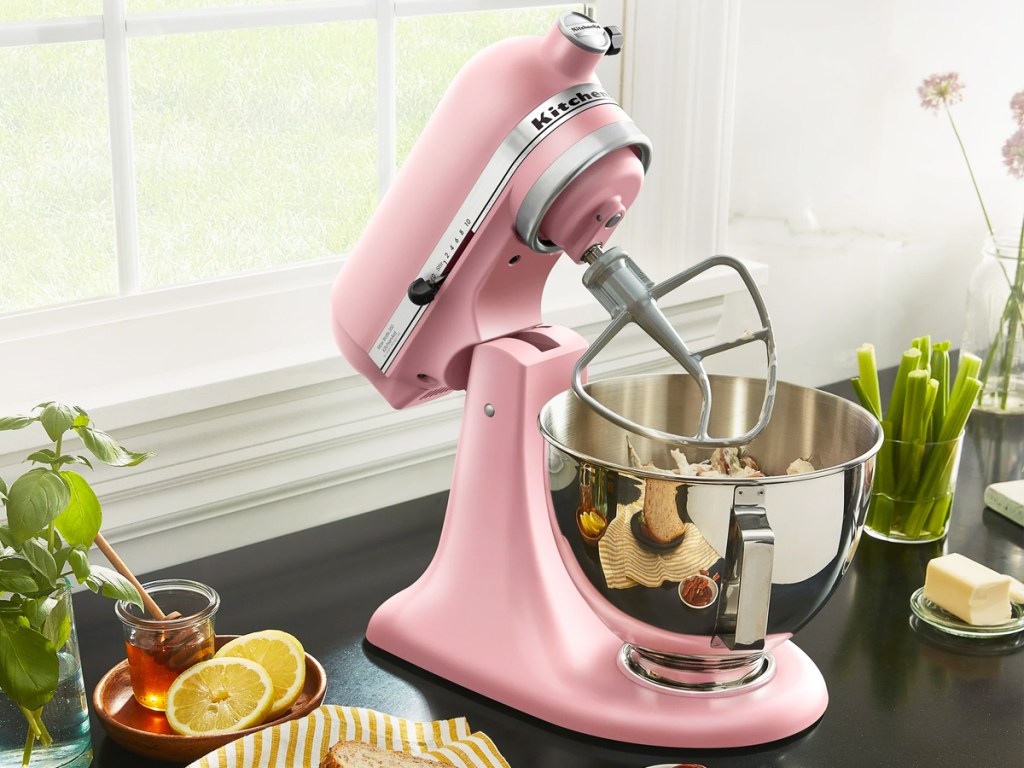 light pink kitchenaid mixer on kitchen counter