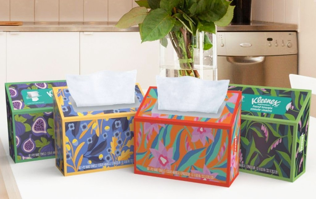 four boxes of kleenex towels on kitchen counter
