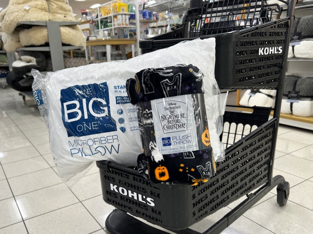 black kohls shopping cart with big one pillow and blanket inside