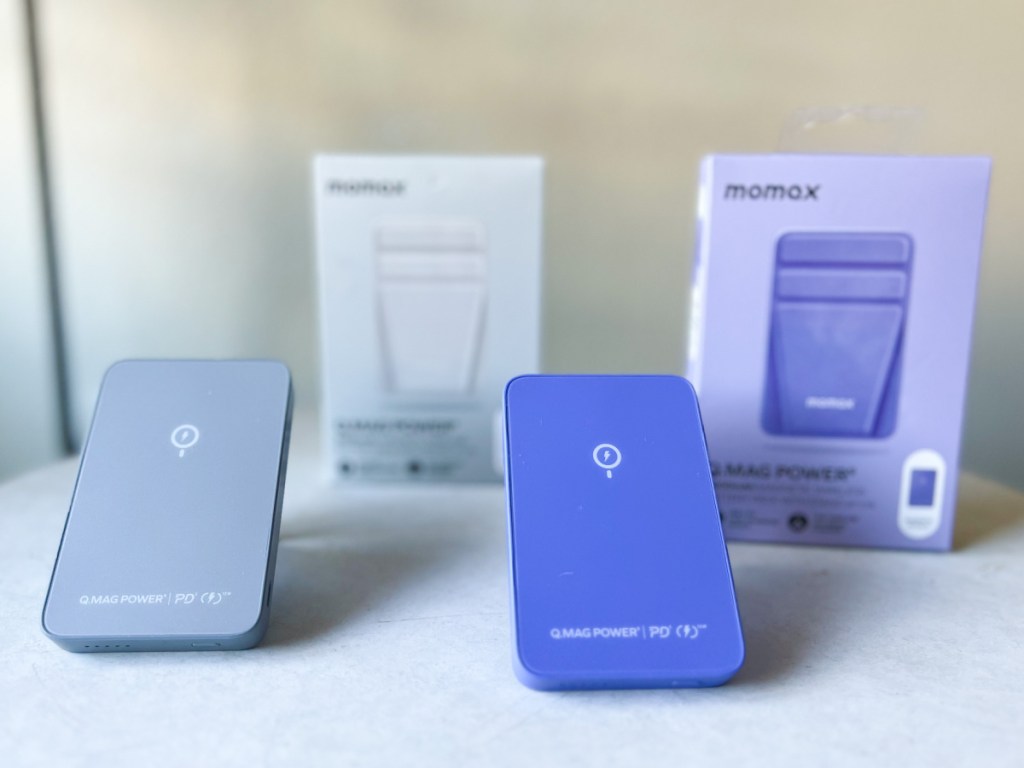 MOMAX Magnetic Wireless Power Banks in grey and purple displayed